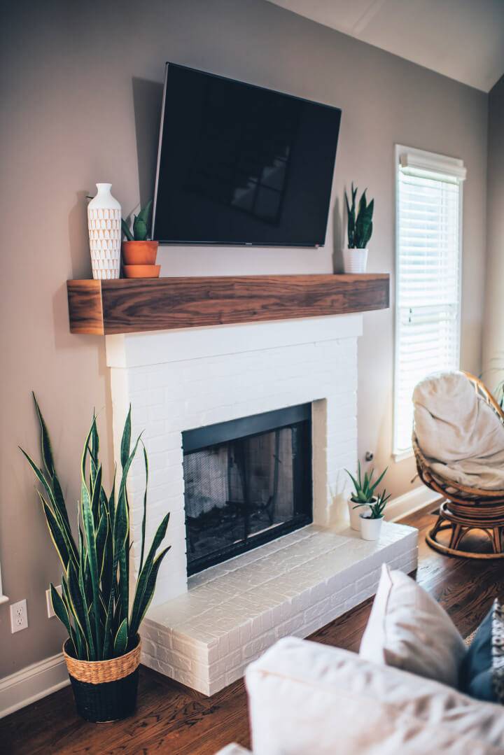 Brick Fireplaces with White Mantels