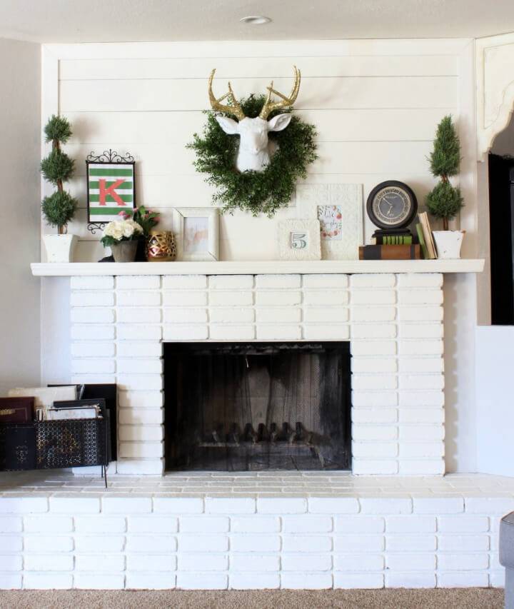DIY Planked Mantle and White Brick Fireplace
